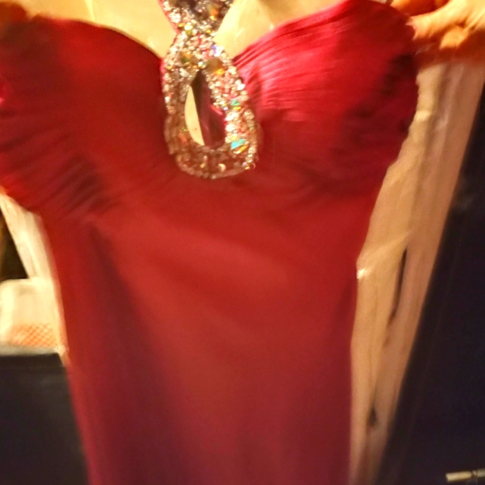 Small ball gown new with tags in plactic